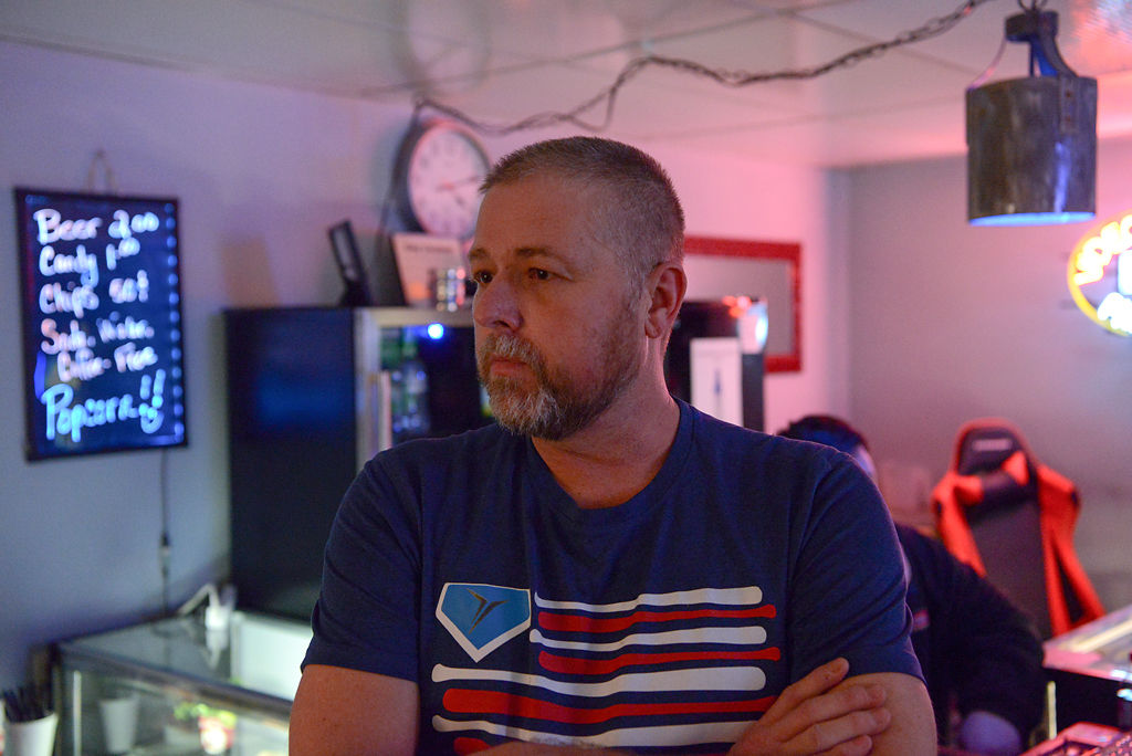 James Lee listens to a question